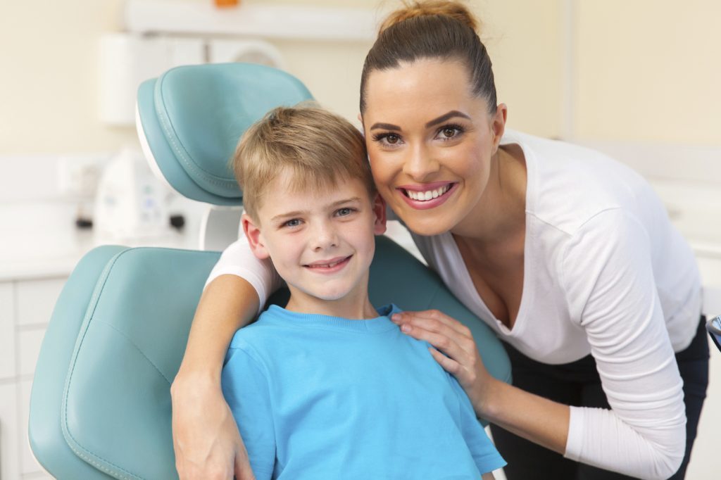 young boy with his mom