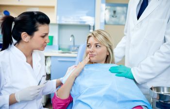 woman undergo dental check-up